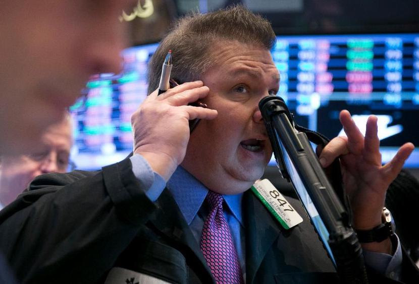 Trader na giełdzie w Nowym Jorku. Fot. Bloomberg. Trader na giełdzie w Nowym Jorku. Fot. Bloomberg.