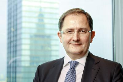 EBOR, którym w Polsce i krajach bałtyckich kieruje Grzegorz Zieliński (z lewej), wspierał wiele prywatnych polskich firm, np. Tele-Fonikę.