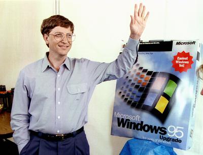 Microsoft CEO Bill Gates stands beside a model  of the new Windows '95 product as he waves to a friend at the Microsoft campus in Redmond, August 23 during rehearsals for the August 24 launch of Windows '95.   The current Microsoft  Windows provides the operating system for about 80 percent of the personal computers sold today,Image: 448212268, License: Rights-managed, Restrictions: , Model Release: no, Credit line: Jeff Vinnick / Reuters / Forum