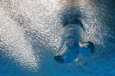 Letnie Igrzyska Olimpijskie 2020 w Tokio. Trening zawodnika w centrum pływackim Tokyo Aquatics Centre 22 lipca 2021 r. Fot.: STEFAN WERMUTH / Reuters / Forum