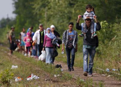 Migranci, uchodźcy