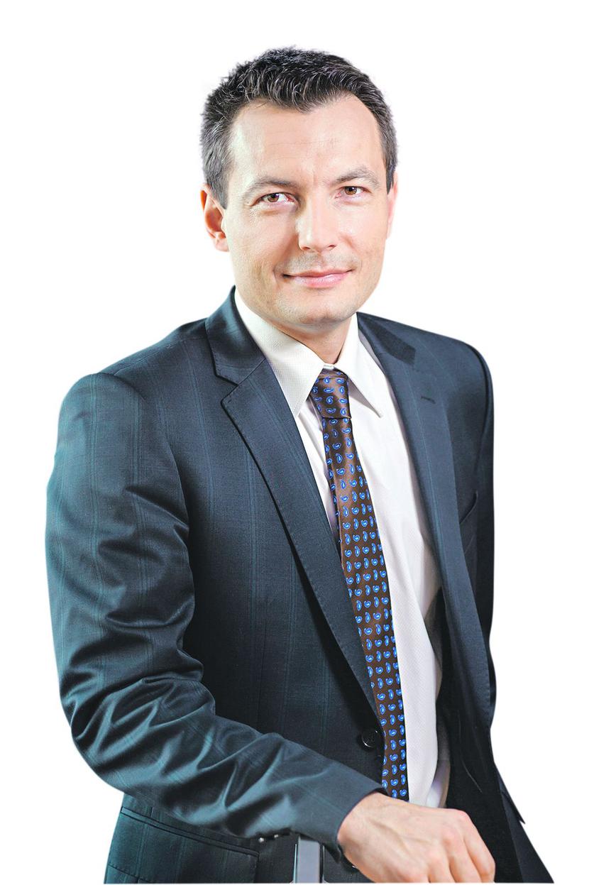 ZA DROGO: Robert Łaniewski, prezes FROB, uważa, że na zmianie taryfy kartowej w Visie skorzystają głównie duże firmy. Dla małych akceptantów zmiana agenta może być zbyt kosztowna. [FOT. ARC] 