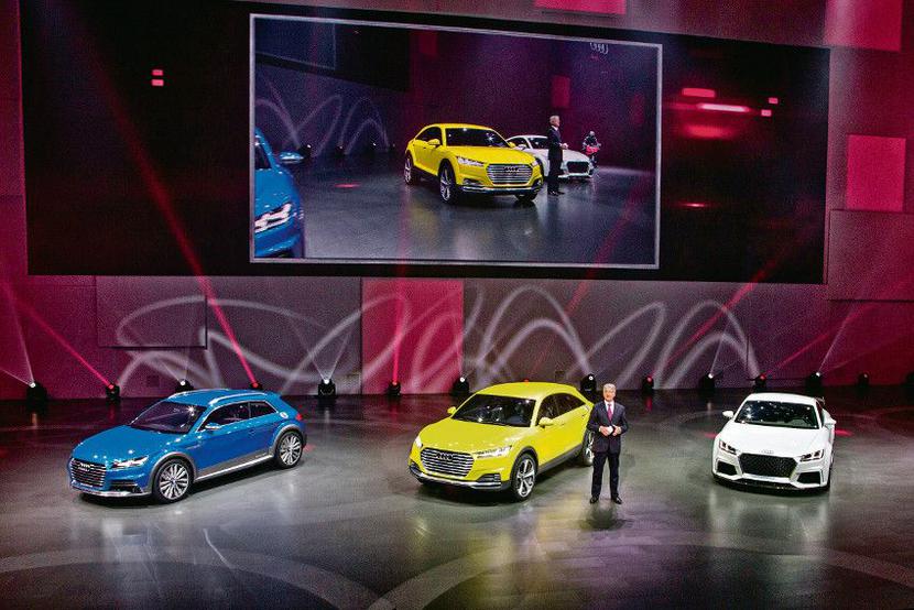 ŻÓŁTA STRZAŁA: Audi wpakowało napęd hybrydowy do prototypu crossovera. Benzynowy silnik współpracuje z dwiema elektrycznymi jednostkami — łączna moc to ponad 400 KM. [FOT. ARC]