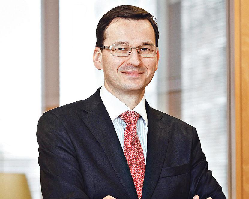 Mateusz Morawiecki, prezes BZ WBK, podtrzymuje tezę wygłoszoną podczas debaty „PB” w cyklu „Czas na patriotyzm gospodarczy”. Deregulacja polskiej gospodarki może zwiększyć PKB nawet o 1 proc. Dlatego powinniśmy ją kontynuować z ogromną determinacją. [FOT. WM]
 
