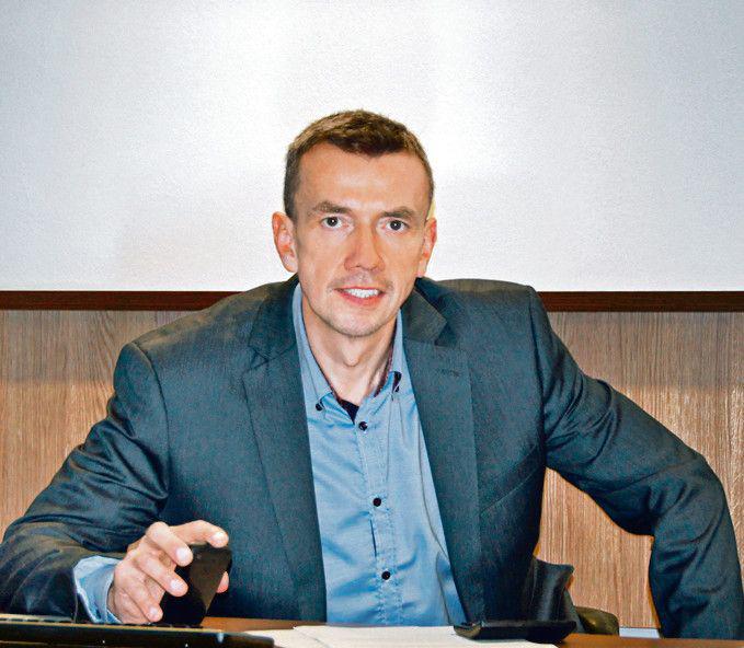 Łącznie udziałowcy Unii osiągną w 2013 r. przychody o wartości przekraczającej 2 mld zł — mówi Grzegorz Kozień, prezes Unii Stalowej. [FOT. ARC]
 